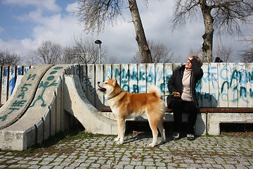 Image showing Lady and her dog