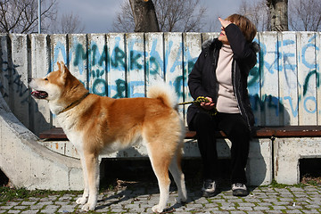 Image showing Lady and her dog