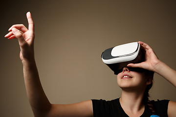 Image showing Woman with glasses of virtual reality