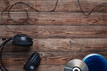 Image showing top view of music cd player equipment on wooden desk