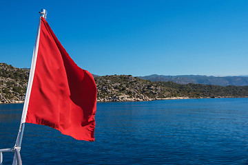 Image showing Red flag from yacht