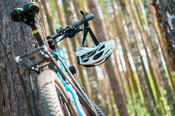 Image showing cycling helmet closeup on bicycle outdoors