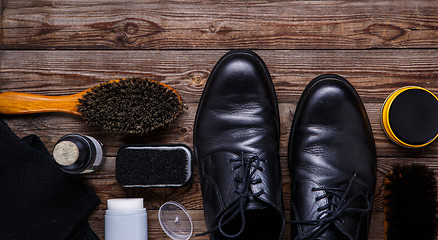 Image showing Shoe wax, brush and boot