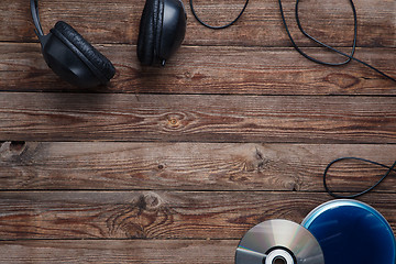 Image showing top view of music cd player equipment on wooden desk