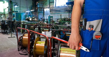 Image showing Worker with instruments