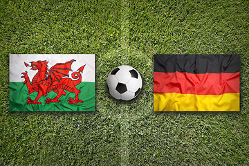 Image showing Wales vs. Germany flags on soccer field