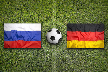 Image showing Russia vs. Germany flags on soccer field