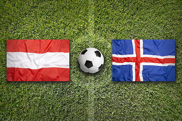 Image showing Austria vs. Iceland flags on soccer field