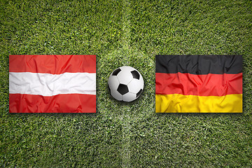 Image showing Austria vs. Germany flags on soccer field