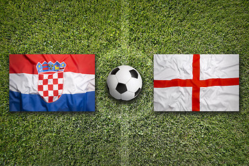 Image showing Croatia vs. England flags on soccer field