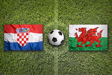 Image showing Croatia vs. Wales flags on soccer field