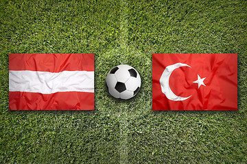 Image showing Austria vs. Turkey flags on soccer field