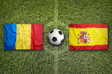 Image showing Romania vs. Spain flags on soccer field