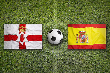 Image showing Northern Ireland vs. Spain flags on soccer field