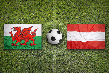 Image showing Wales vs. Austria flags on soccer field