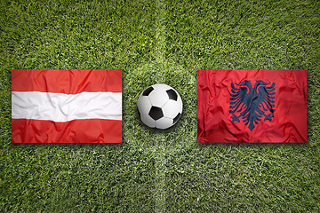 Image showing Austria vs. Albania flags on soccer field