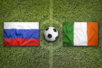 Image showing Russia vs. Ireland flags on soccer field