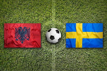 Image showing Albania vs. Sweden flags on soccer field