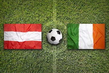 Image showing Austria vs. Ireland flags on soccer field