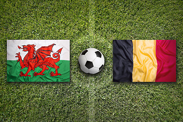 Image showing Wales vs. Belgium flags on soccer field