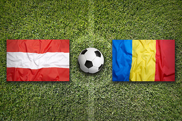 Image showing Austria vs. Romania flags on soccer field