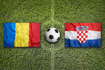 Image showing Romania vs. Croatia flags on soccer field