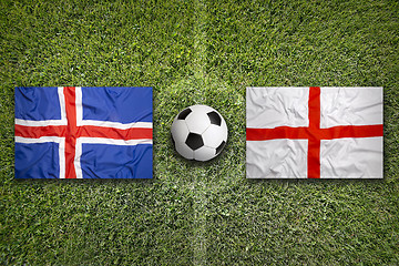 Image showing Iceland vs. England flags on soccer field