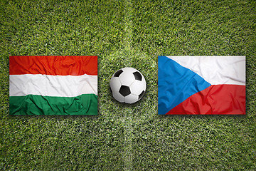 Image showing Hungary vs. Czech Republic flags on soccer field