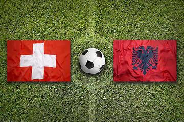 Image showing Switzerland vs. Albania flags on soccer field