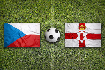 Image showing Czech Republic vs. Northern Ireland flags on soccer field