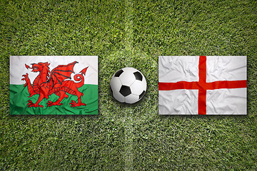 Image showing Wales vs. England flags on soccer field