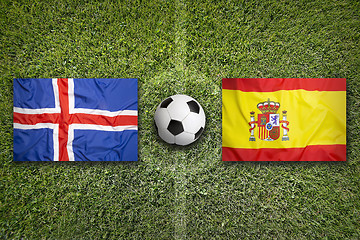 Image showing Iceland vs. Spain flags on soccer field