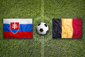 Image showing Slovakia vs. Belgium flags on soccer field