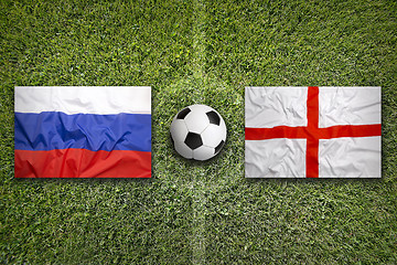 Image showing Russia vs. England flags on soccer field