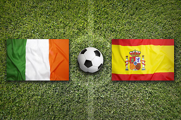 Image showing Ireland vs. Spain flags on soccer field