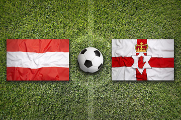 Image showing Austria vs. Northern Ireland flags on soccer field