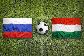 Image showing Russia vs. Hungary flags on soccer field