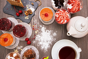 Image showing Table with fruit cakes