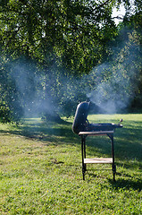 Image showing Barbecue in a green garden