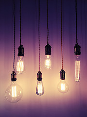 Image showing Industrial style light bulbs on purple background