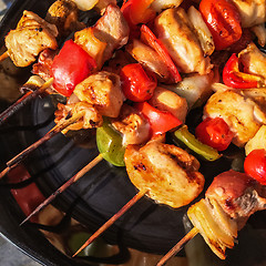 Image showing Skewers with grilled meat and vegetables