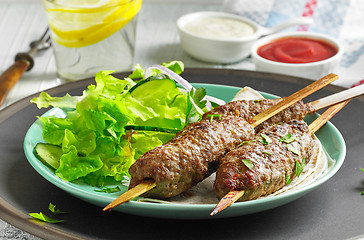 Image showing grilled minced meat skewers kebabs