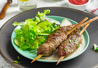 Image showing grilled minced meat skewers kebabs