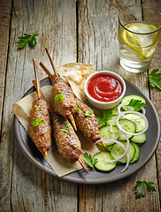 Image showing grilled minced meat skewers kebabs