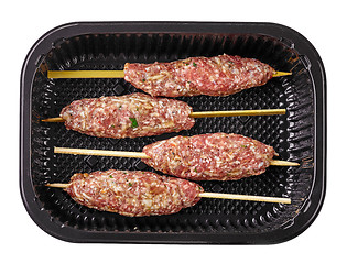 Image showing fresh raw minced meat skewers in plastic box