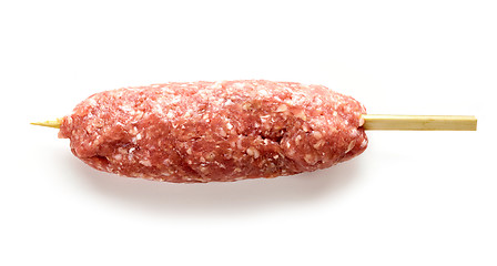 Image showing raw minced meat skewer kebab