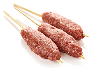 Image showing fresh raw minced meat skewers kebabs