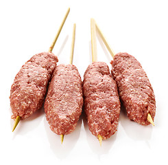 Image showing fresh raw minced meat skewers kebabs