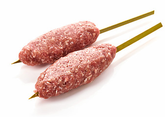 Image showing fresh raw minced meat skewers kebabs