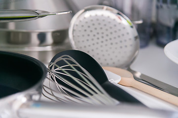 Image showing Various tableware on shelf in the kitchen